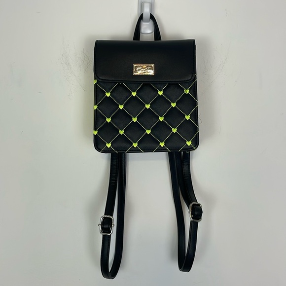 Luv Betsey Johnson Small Black with Lime Green Hearts
Backpack Purse. - Picture 3 of 10
